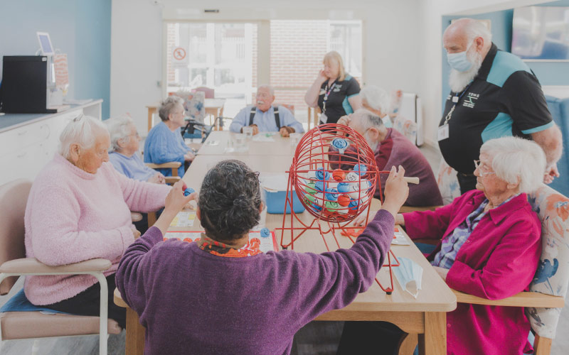 Photo of residents at an aged care home playing bingo